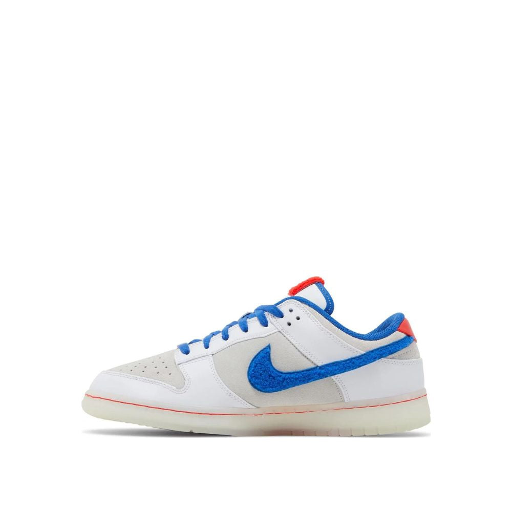 side view of Nike Dunk Low 'Year of the Rabbit - White Rabbit Candy'; left pair