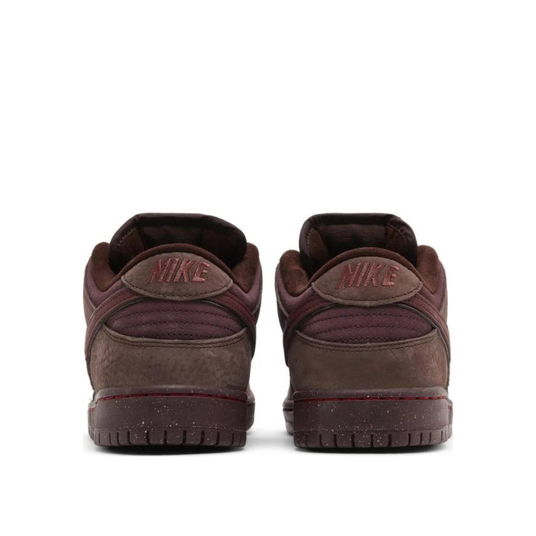 side view of Nike Dunk Low SB CITY OF LOVE - Burgundy Crush; left pair