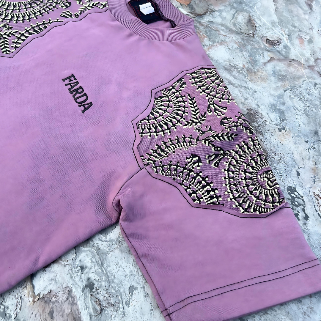 Closeup view of Farda Dawnfest Pink Blockprinted T-Shirt; right arm