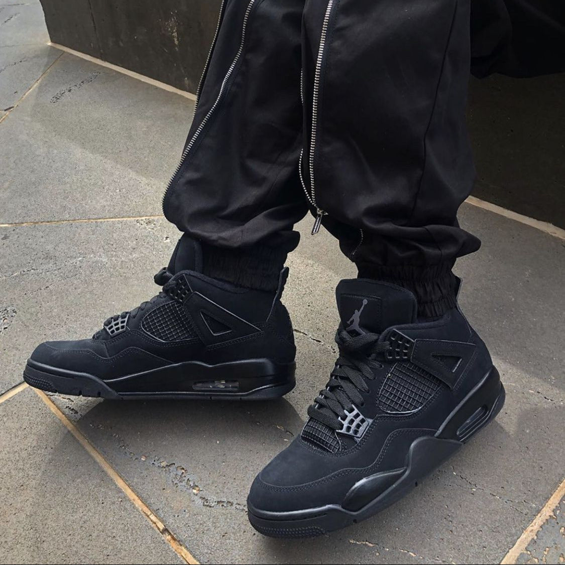 jordan 4 black cats on feet