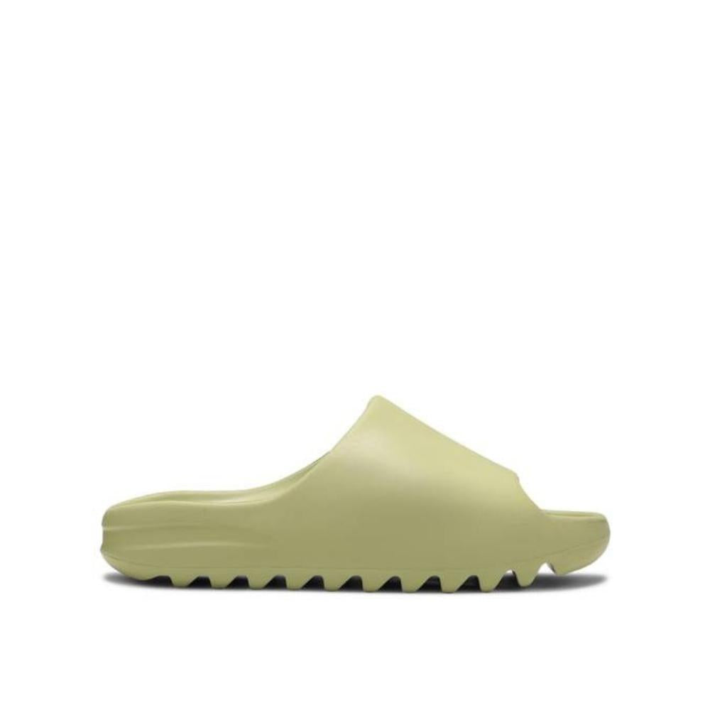 side view of Adidas Yeezy Slides Resin; right pair