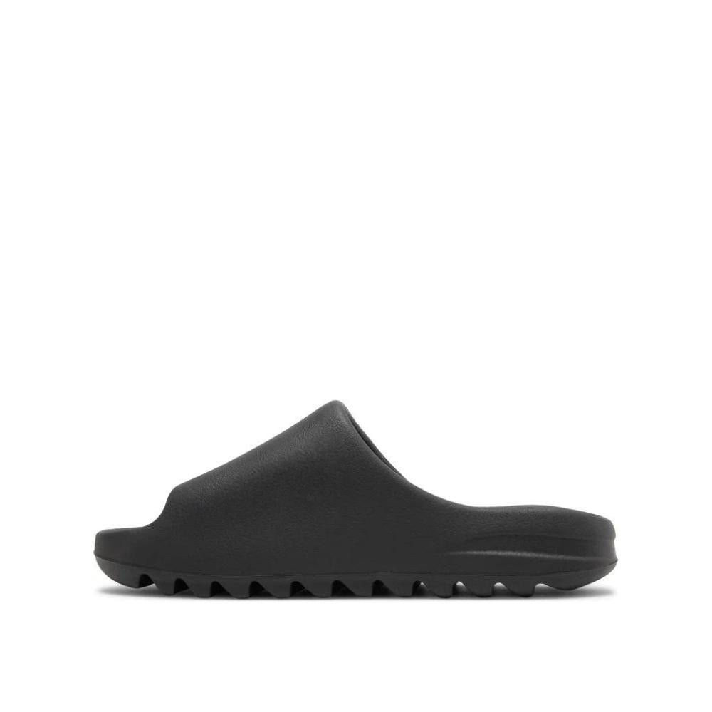 side view of Adidas Yeezy Slides Onyx; left pair
