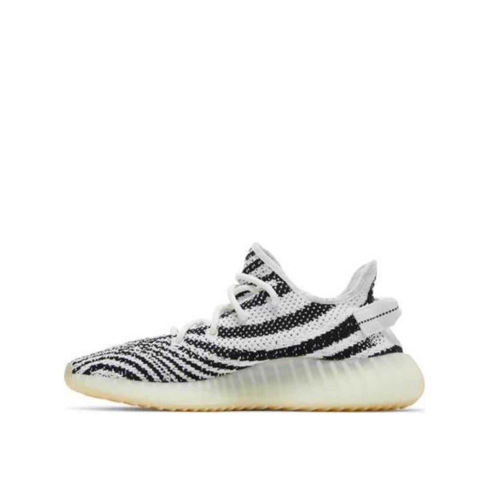 side view of Adidas Yeezy 350 v2 Zebra; left pair