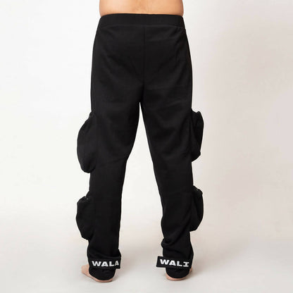 Front view of model wearing black heavyweight utility cargo pants by WalaWali
