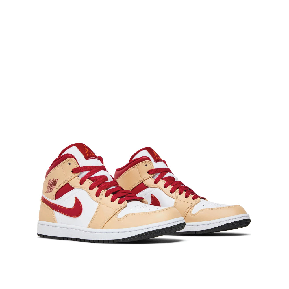 Angled view of Air Jordan 1 Mid Cardinal Red Curry
