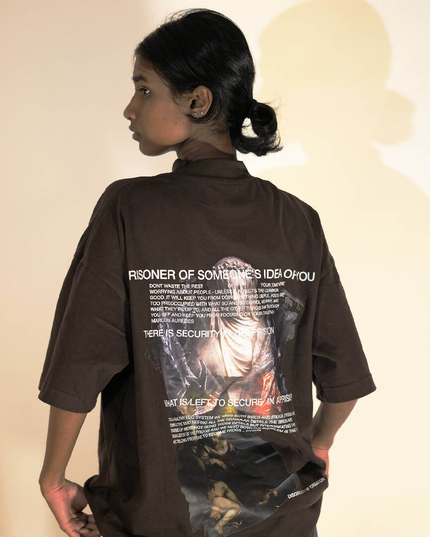 Female model wearing 'Prisoner of Mind' graphic T-Shirt, viewed from the back 3