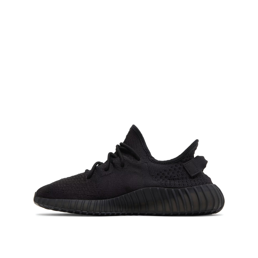 Side view of Adidas Yeezy 350 Onyx; left pair