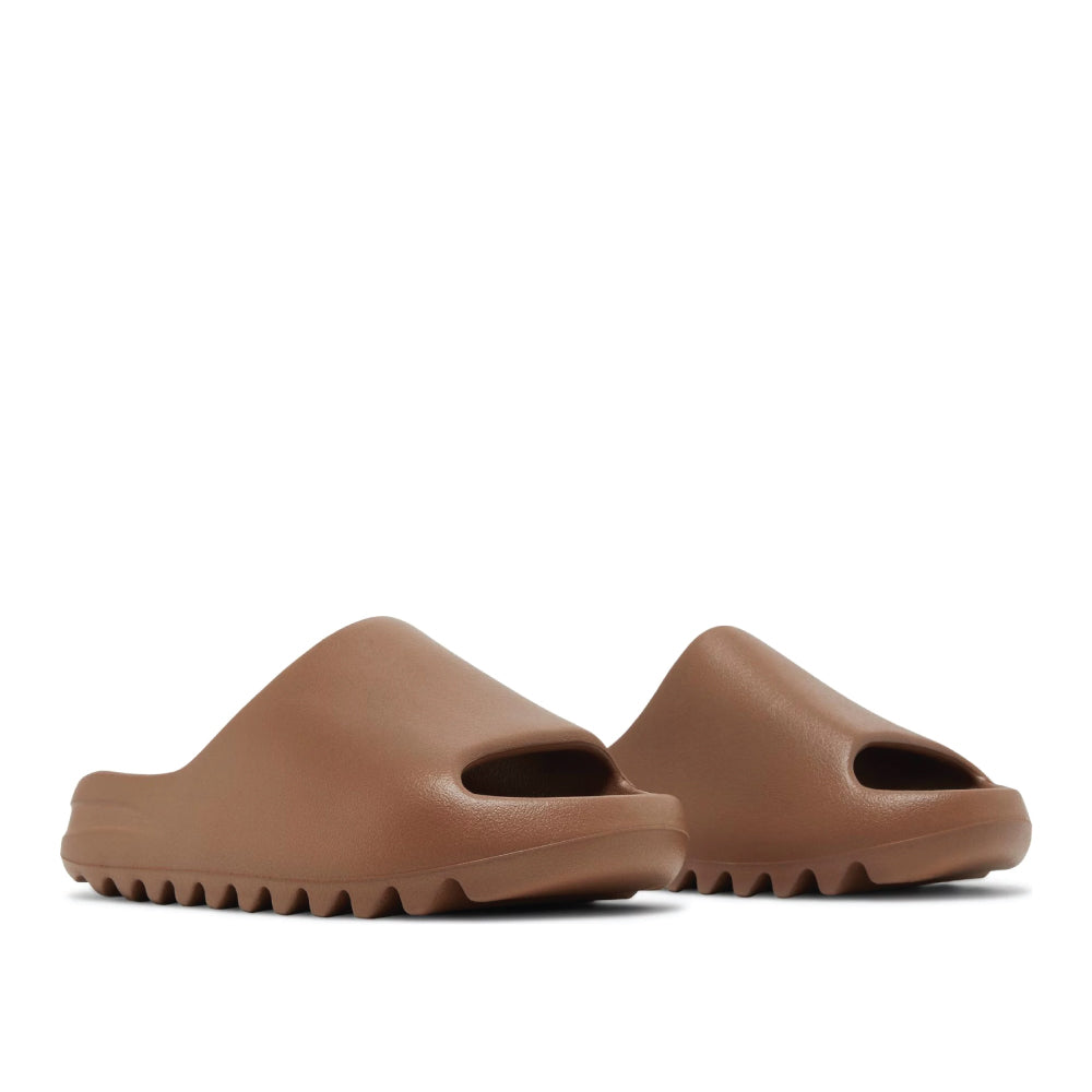 angled view of Adidas Yeezy Slides Flax